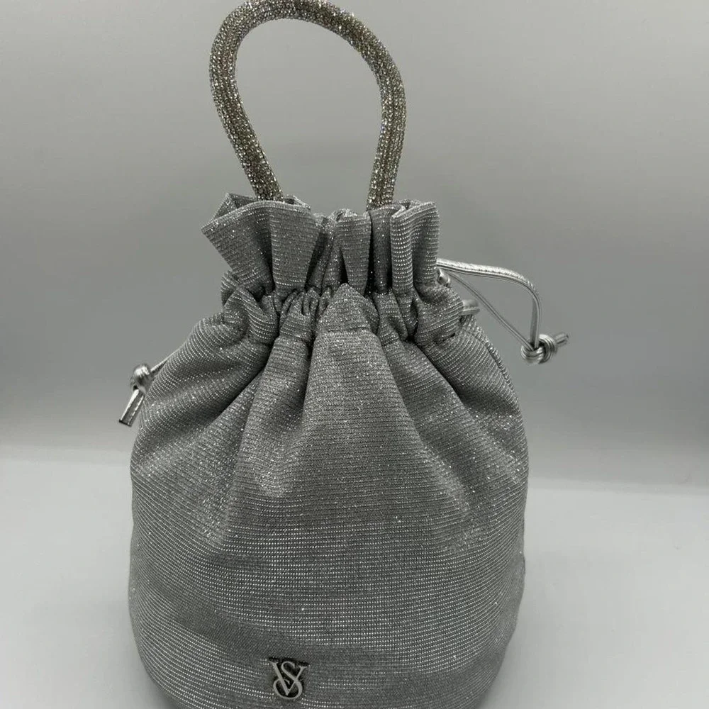 Victoria's Secret Silver glittery drawstring bag with rhinestone handle